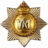 RCR cap badge, 1894 Guelphic crown pattern