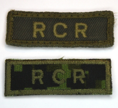 Examples of the olive drab and temperate woodland CADPAT embroidered combat tabs produced for The RCR. Photo by Capt M. O'Leary (Private Collection)